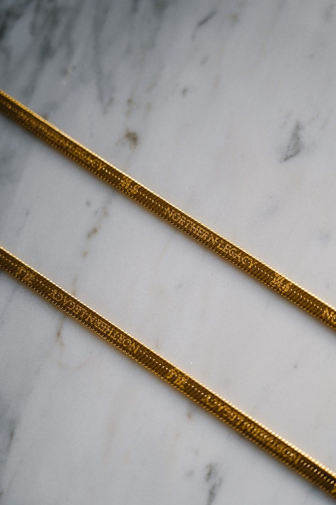 Northern Legacy Herringbone Colliers Gold